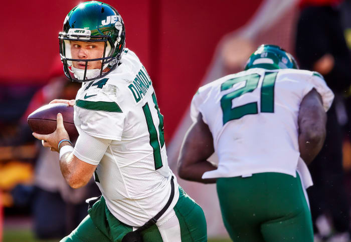 Sam Darnold looks upfield after executing a play-action fake for the Jets